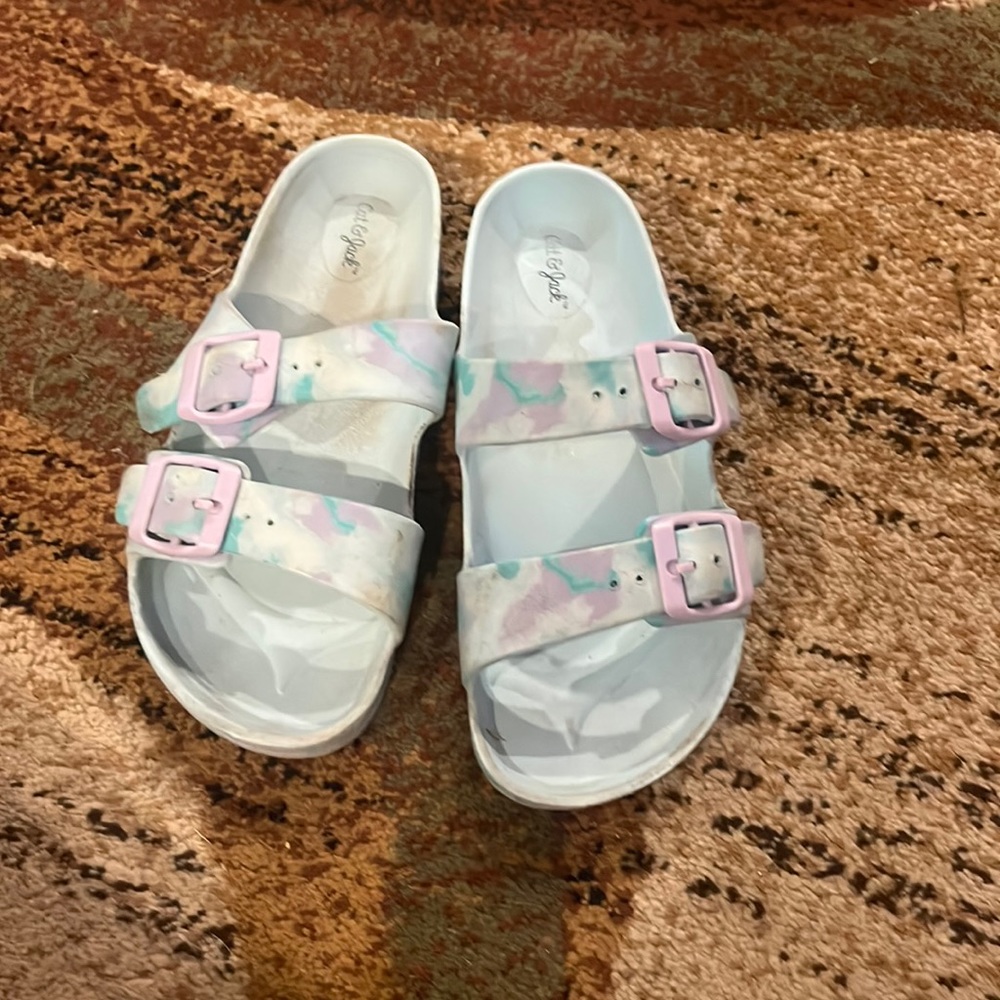 A pair of slides size two